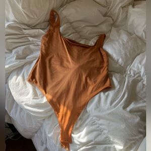 Large forever 21 orange body suit
